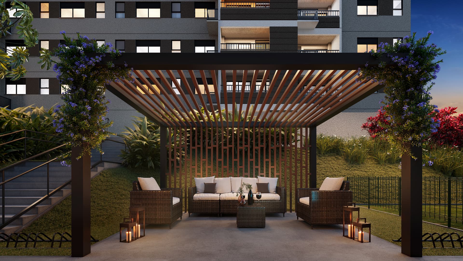 Gazebo com lounge externo iluminado ao entardecer